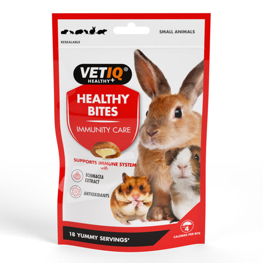 A 30g red resealable pouch of VETIQ Healthy Bites Immunity Care treats for rabbits, guinea pigs, and hamsters.