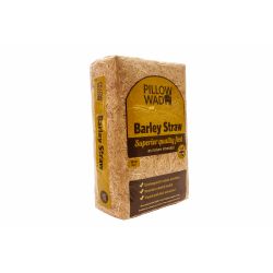 A compressed, golden Pillow Wad straw bale for small animal bedding.