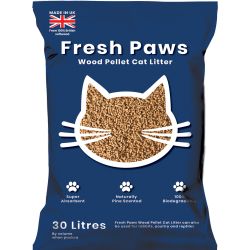 A large bag of Fresh Paws Wood Cat Litter surrounded by loose, light brown compressed wood pellets
