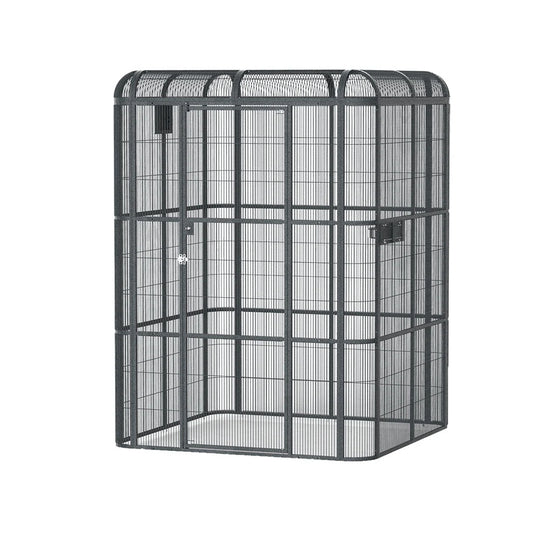 A massive, charcoal-black Rainforest Cages walk-in bird aviary featuring heavy-duty mesh panels and a large front security door.
