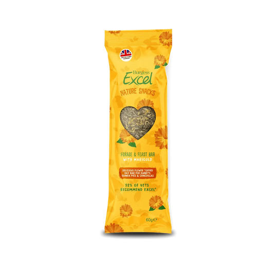 A compressed Burgess Excel meadow hay forage bar topped with bright golden-yellow marigold petals.