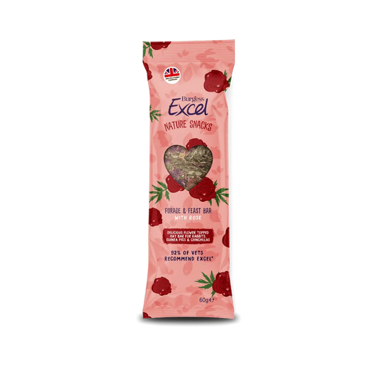 A compressed Burgess Excel meadow hay foraging bar topped with pink rose petals and dried green herbs.